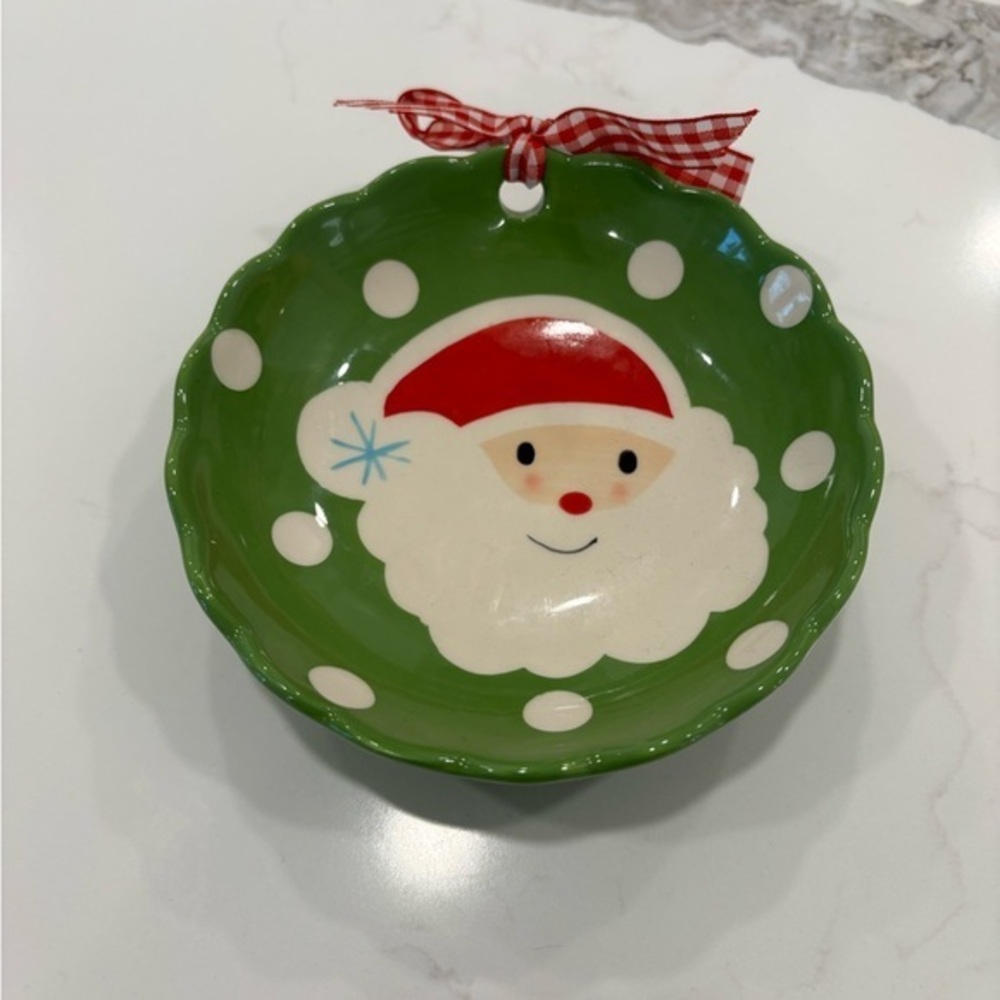 Hallmark Santa 5” in circumference. Green w/white polkadots and red gingham bow.